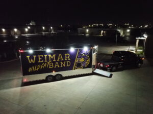 Upgraded exterior lighting for Weimar marching band. Flood lights for small bumper trailer solution.