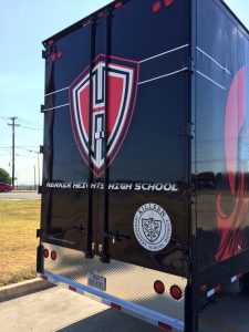 Harker Heights Semi Equipment Trailer with new Aluminum bumper cover. Diamond Treadplate Rear Bumper. Back Door Graphics