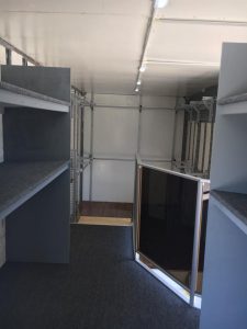 Marching Band Uniform Storage in Semi Equipment Trailer