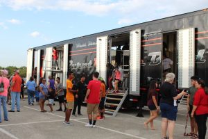 West Mesquite High School Marching Band Semi Trailer Side Stairs Director's Platform, LED Flood Lights Exterior black orange graphics wrap