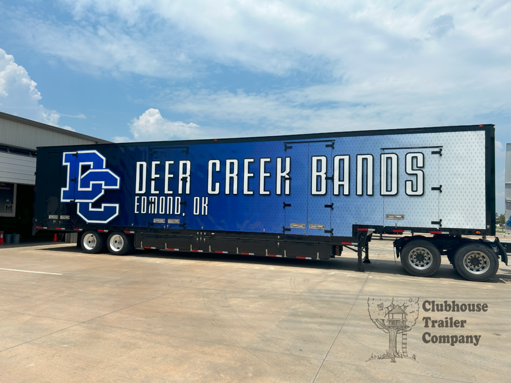 Deer Creek High School in Edmond, Oklahoma marching band semi trailer. Custom designed vinyl wrap, second floor, and storage solution for pit equipment, instruments, and uniforms