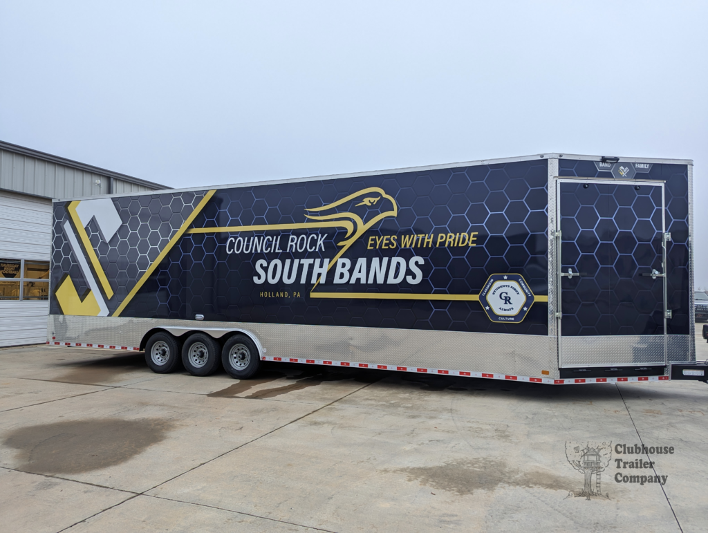Council Rock South High school marching band bumper pull trailer for equipment, uniforms, and instruments with custom vinyl wrap