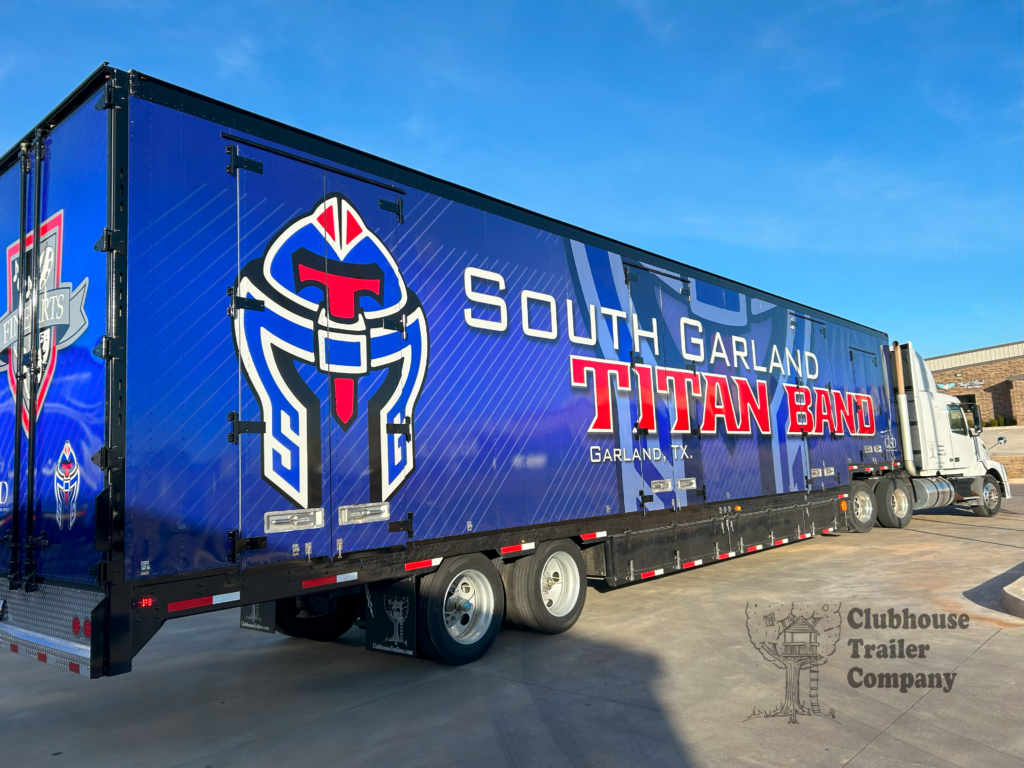 South Garland High School marching band semi trailer with custom blue graphic vinyl wrap