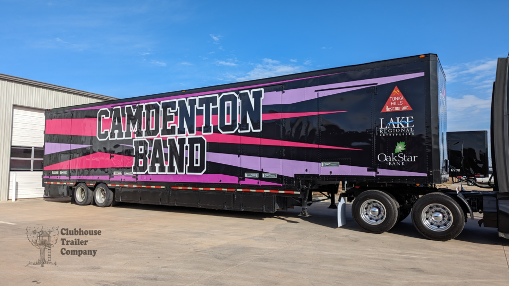 High school marching band trailer with custom vinyl graphic wrap and interior.