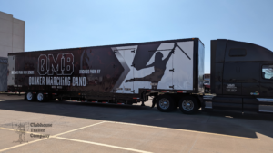 Custom vinyl wrap on a high school marching band trailer. Solar lights, second floor, instrument storage, and designed vinyl.