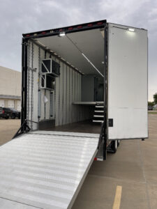 Custom Marching band semi trailer with powered ramp and stairs, lighting, and second floor