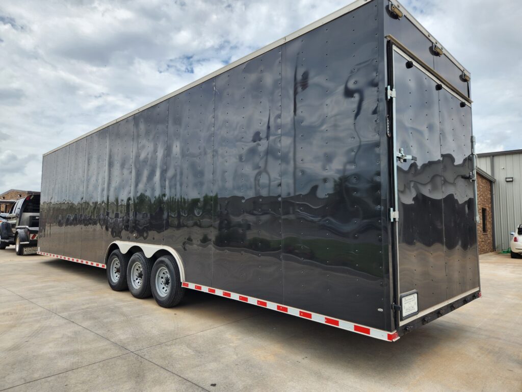 Black bumper pull trailer for marching bands