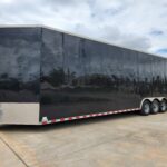 Driver side exterior of 36 foot bumper pull trailer for marching band