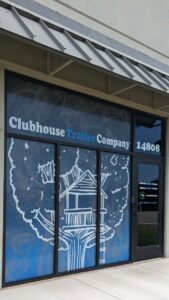 Custom printed and designed perforated window vinyl for band rooms, business fronts, and more.
