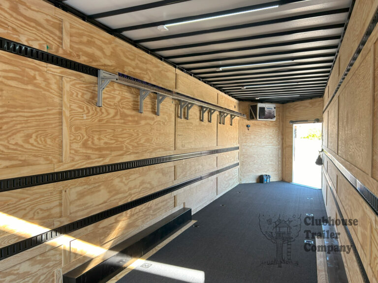 Bumper pull band trailer with uniform storage