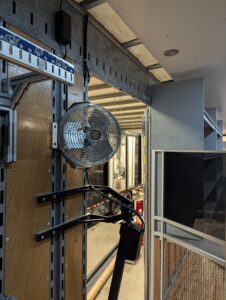Fans mounted in marching band semi trailer.