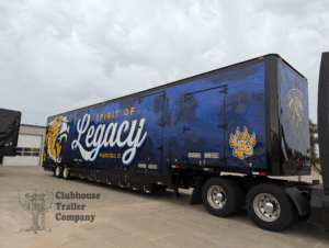 Legacy High School marching band trailer 52 foot semi with blue and black custom graphics and interior build out.