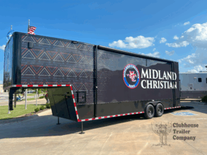 Midland Christian High School Marching gooseneck trailer with custom black vinyl graphic wrap and awnings