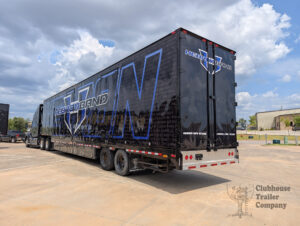 Hebron High School Marching band semi trailer with custom designed graphic wrap with flying carpet, drum wall, nose ramp, and manual stairs.