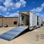 Effingham County High marching band semi trailer with solar power, batteries, electric ramp, and director's perch