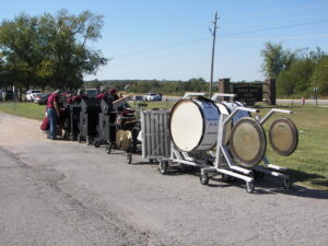 Percussion pit carts hooked for towing to marching field