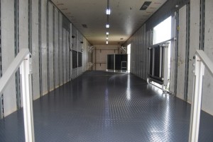 Inside 2nd Floor of Bixby Marching Trailer with Director's Platform, Barn Door Fence and Outside Lighting. Inside lighting is slim to the roof and is unobtrusive.