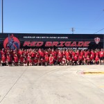 Happy students at Harker Heights High school after the delivery of their new semi Band Trailer!