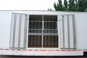 This mesh locking gate increases safety in our marching band trailers. 