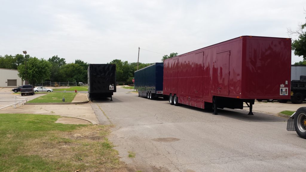 New Painted Semi Trailers awaiting graphics application and interior build-out