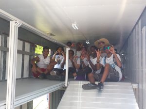 Killeen Students Exploring the interior upper deck of their semi trailer