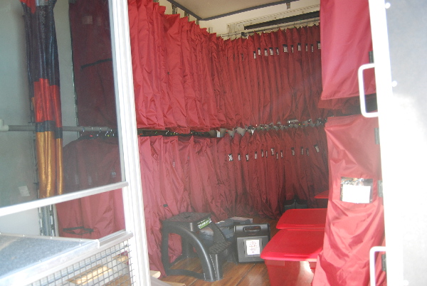 Front Uniform Storage in Edmond Memorial High School's semi trailer. These racks can hold 250+ uniforms.