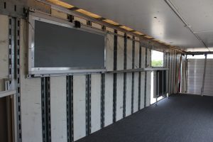 John Horn Band Semi Trailer with Folding Shelves Storage Solution