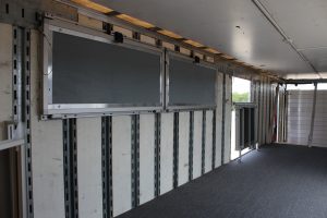 John Horn Band Semi Trailer with Folding Shelves Storage Solution