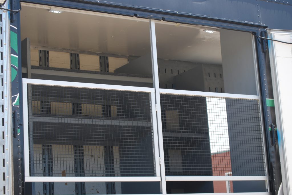 Lake Dallas High School Marching Band Semi Equipment Trailer 2nd Floor Gate. Makes for easy loading of large instruments to the 2nd floor!