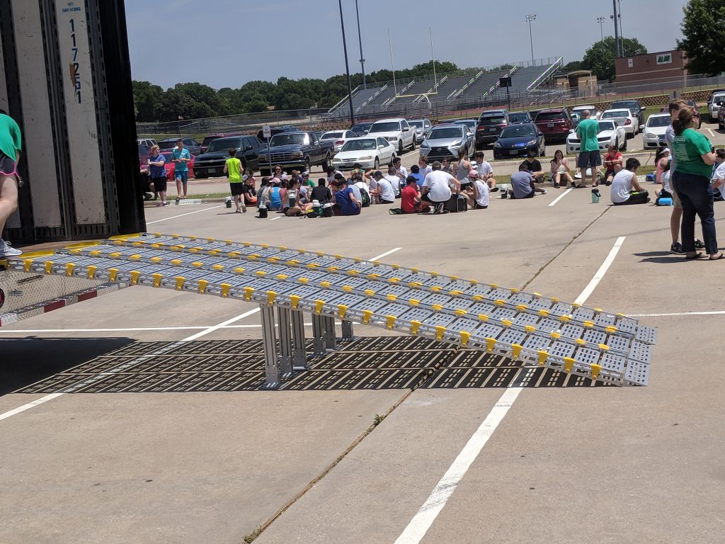 Lake Dallas High School Marching Band Semi Equipment Trailer Aluminum Loading Ramps. These lightweight ramps can roll-up to easily store inside the trailer!