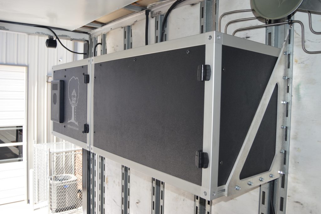 Electrical Cabinet mounted on E-Track rails in Marching Band Semi Equipment Trailer