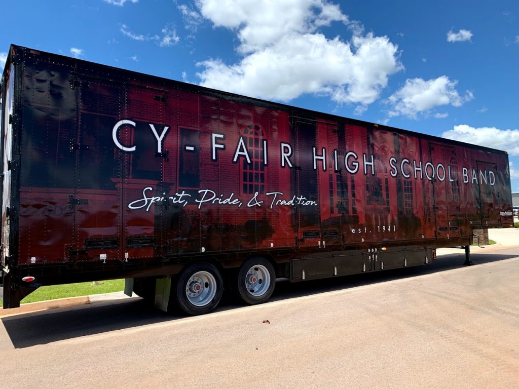 Cy-Fair High School Marching Band Semi Equipment Moving Band Trailer Exterior Red and Black
